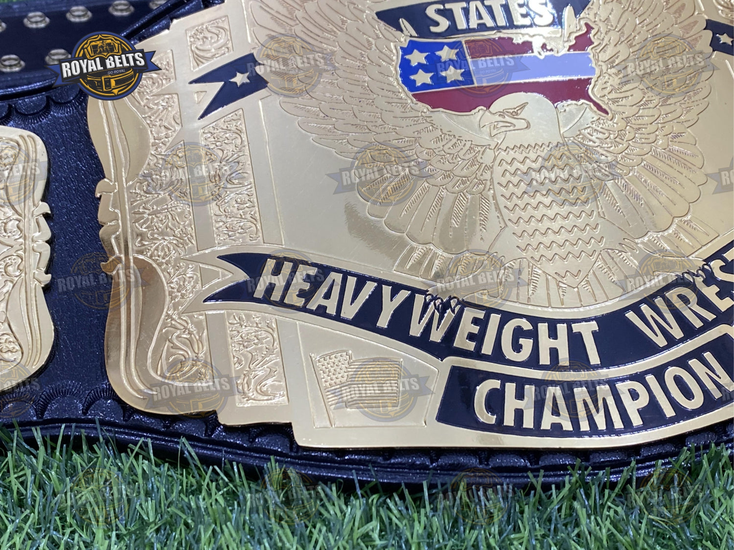 WCW US 3 Plated belt displaying bold center plate, thick metal, reinforced leather backing