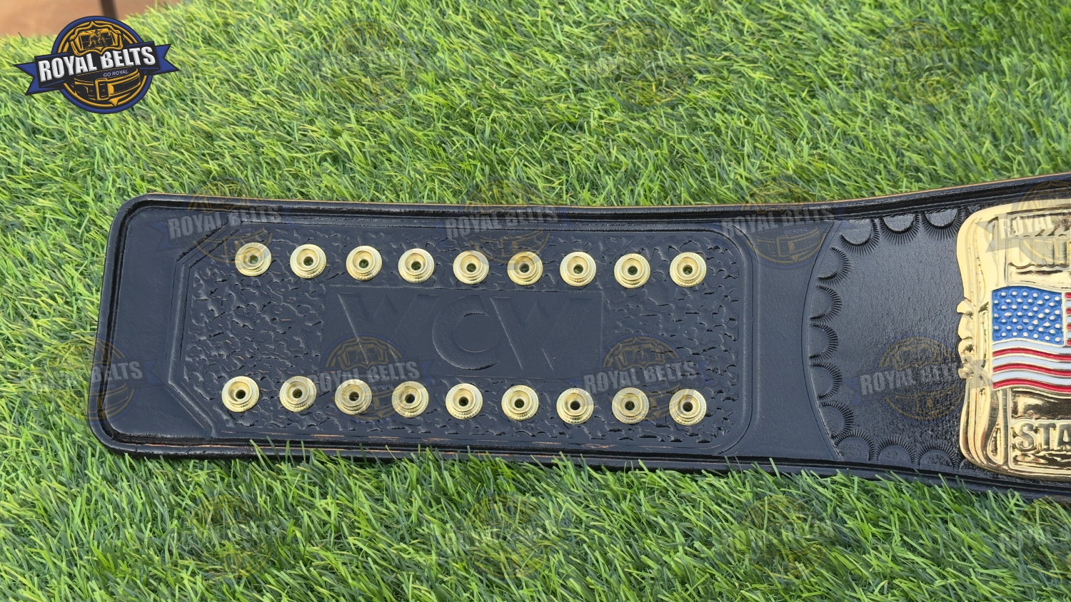 WCW belt featuring beveled center plate, HD CNC etching, polished gold finish, premium black leather strap 