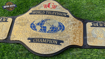 TV championship belt featuring raised center plate, polished zinc finish, thick black leather strap Made by Royal Belts