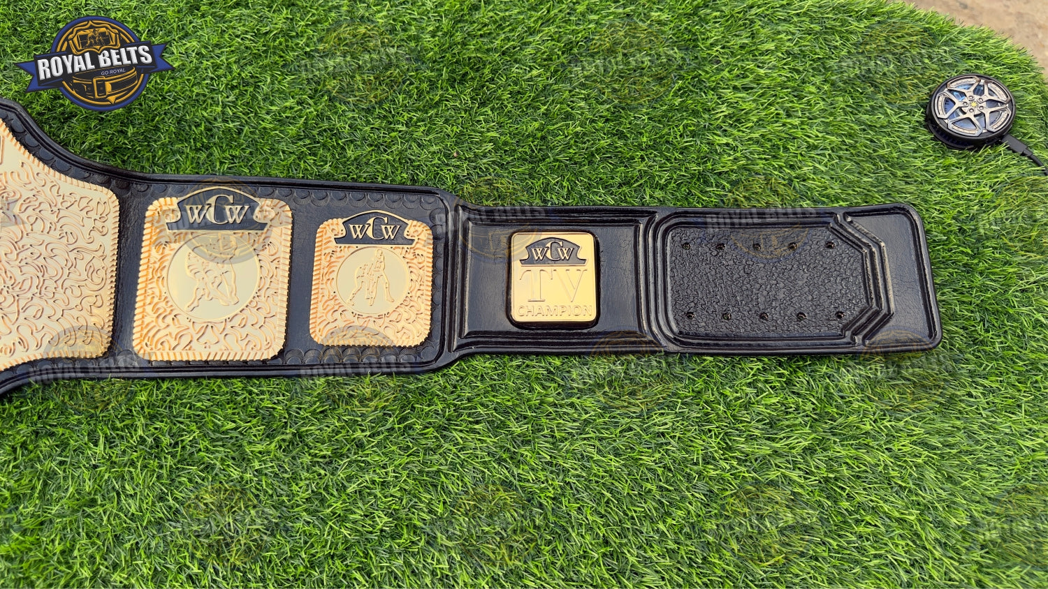 TV championship belt with ornate HD CNC side plates, polished zinc, detailed gold center, premium leather strap