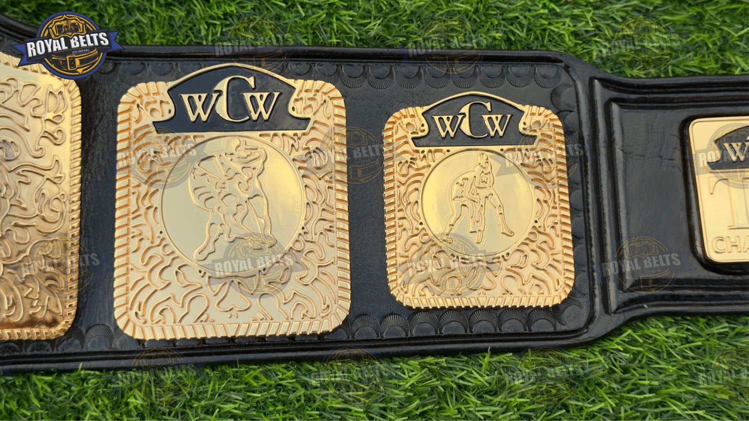 Television belt HD CNC with bold raised center emblem, mirror plated gold, thick stitched black leather strap