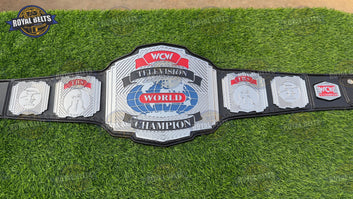Television championship belt featuring raised CNC center emblem, polished zinc, premium black leather backing Crafted by Royal Belts