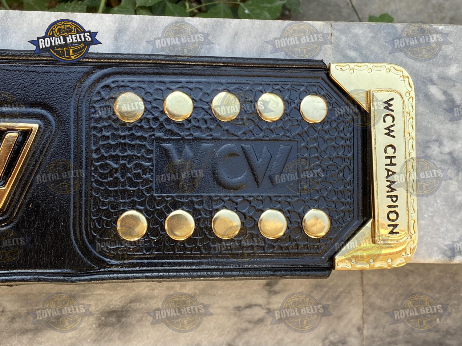 Custom WCW belt with multi-layered center and side plates, HD engraved detailing, premium black leather