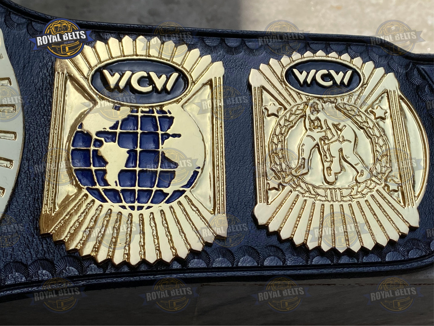 WCW World Wrestling belt with mirror polished gold plates, reinforced black leather backing, engraved detailing