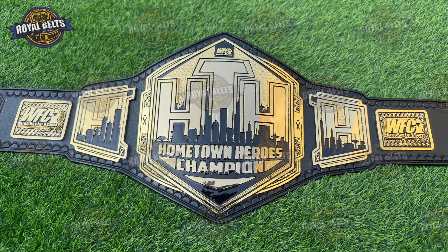 Hometown Heroes title belt displaying bold lettering and smooth black leather texture