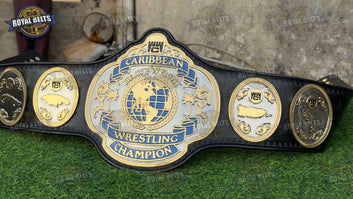 Custom WWC Caribbean title belt with raised center emblem, mirror polished dual plated , adjustable leather Crafted by Royal Belts