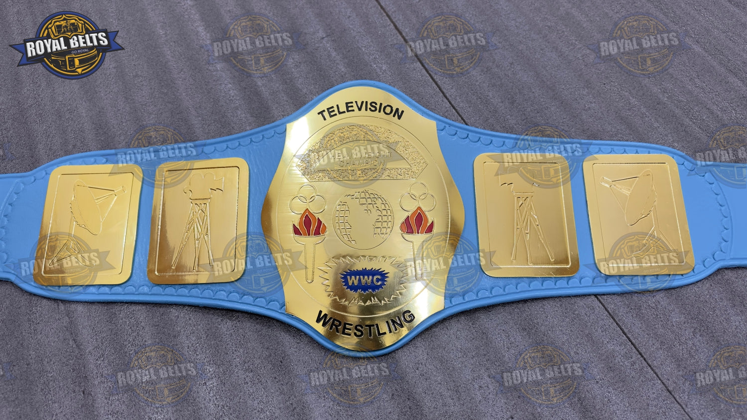 WWC TV Wrestling championship belt with gold plated center plate, blue leather strap, snap closure Made by Royal Belts