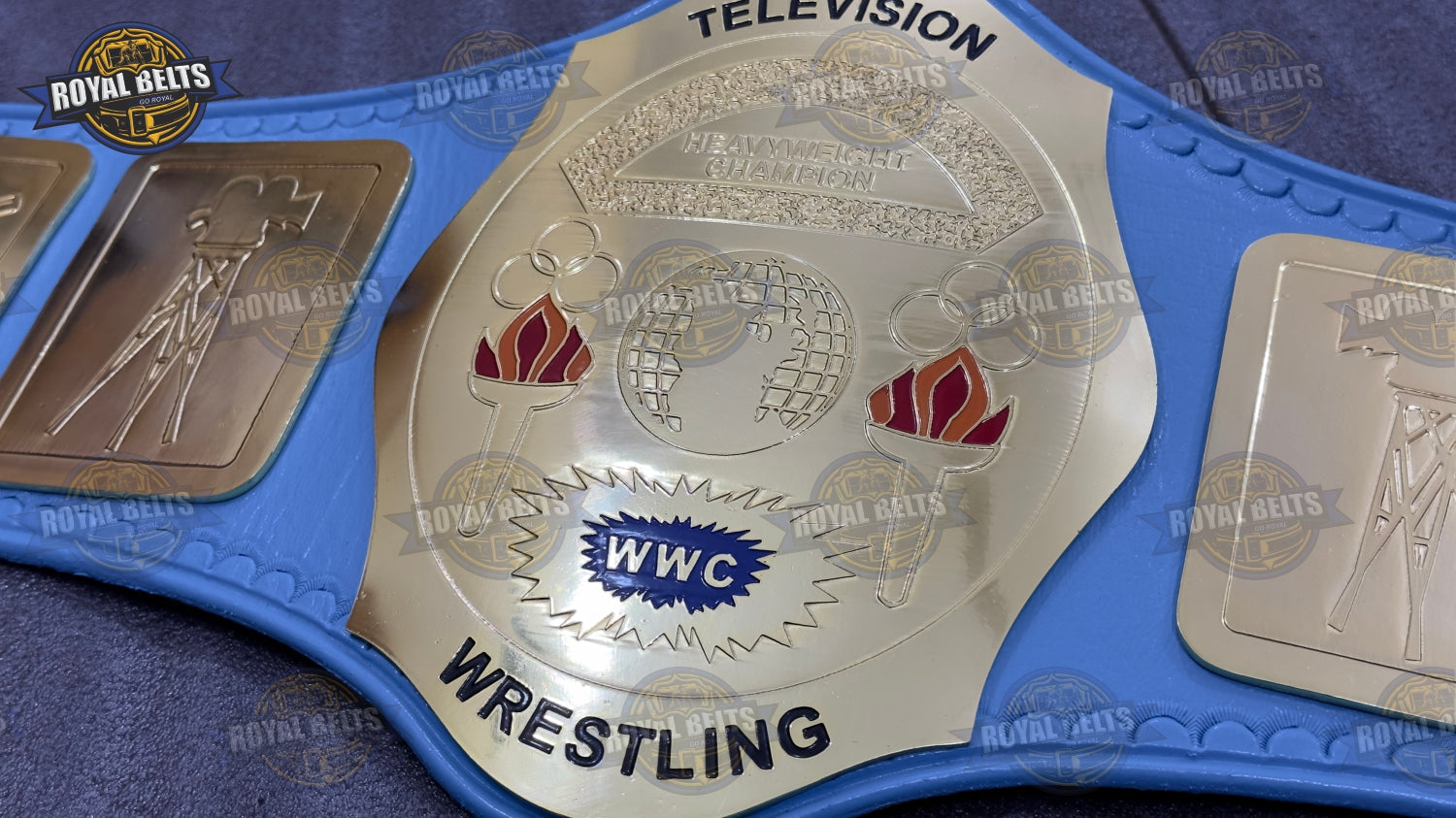 TV wrestling championship belt with layered gold plates, high gloss finish, reinforced blue leather