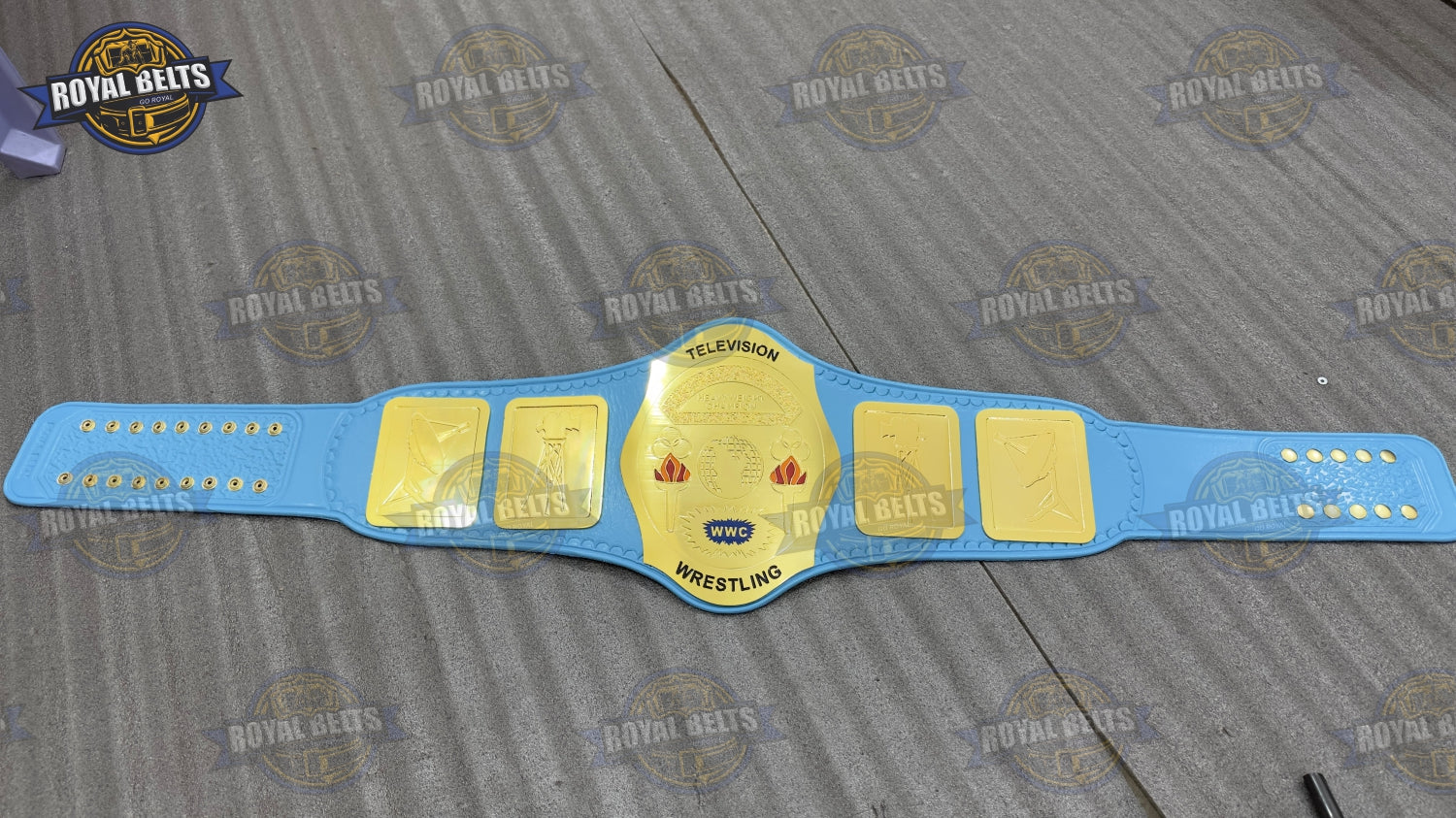 Custom WWC TV belt with ornate side plates, deep engraving, premium genuine leather strap