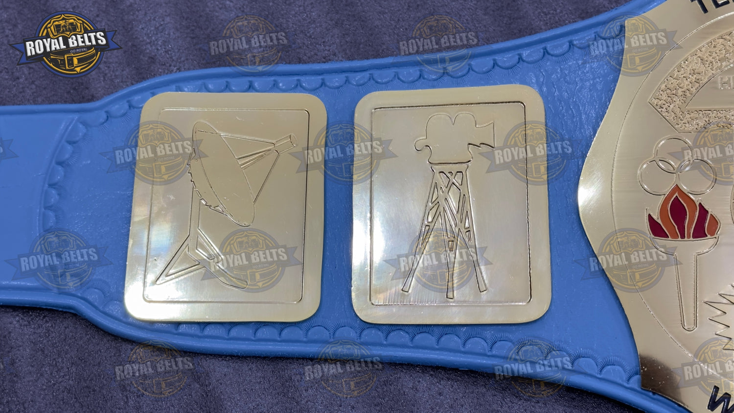 WWC TV Wrestling title belt displaying bold embossed center plate, thick metal construction, snap fit leather