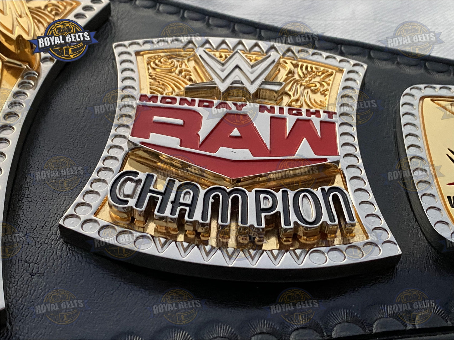 Custom World Heavyweight belt showcasing detailed CNC engraving, stacked dual plates, durable leather strap