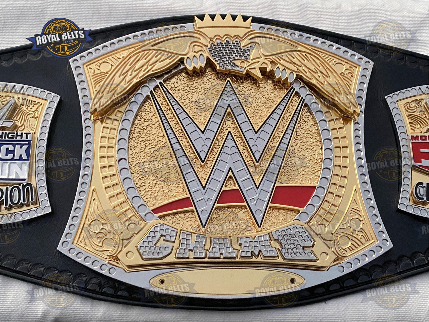 WWE Spinner title belt with layered dual center, engraved WWE logo, reinforced black leather strap Crafted by Royal Belts