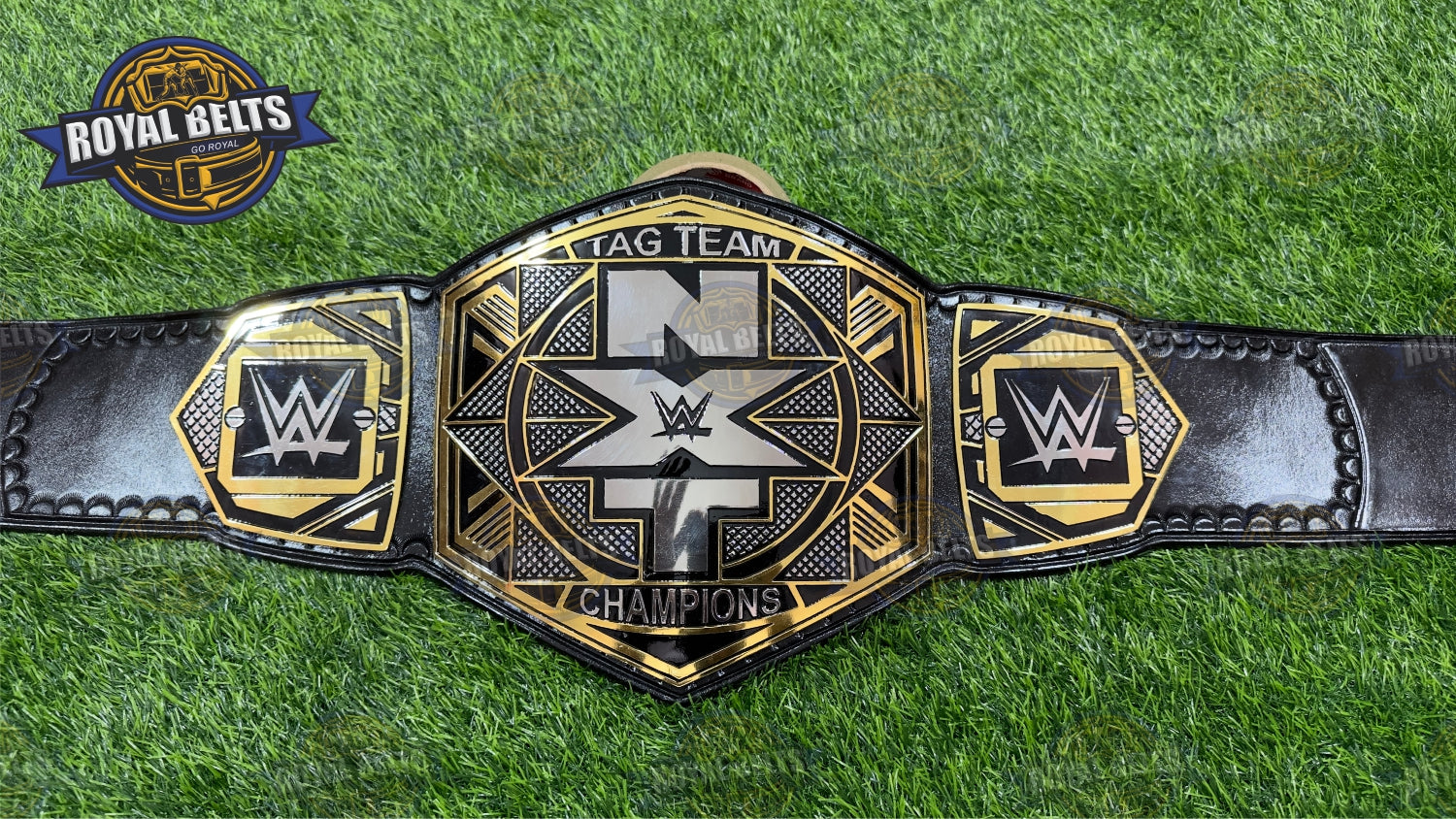 WWE NXT Wrestling Championship Belt with raised logo center plate, adjustable black leather backing Made by Royal Belts