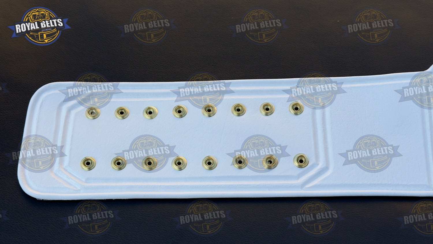 Custom WWE US belt with deep etched center plate, premium brass metal, stitched leather strap