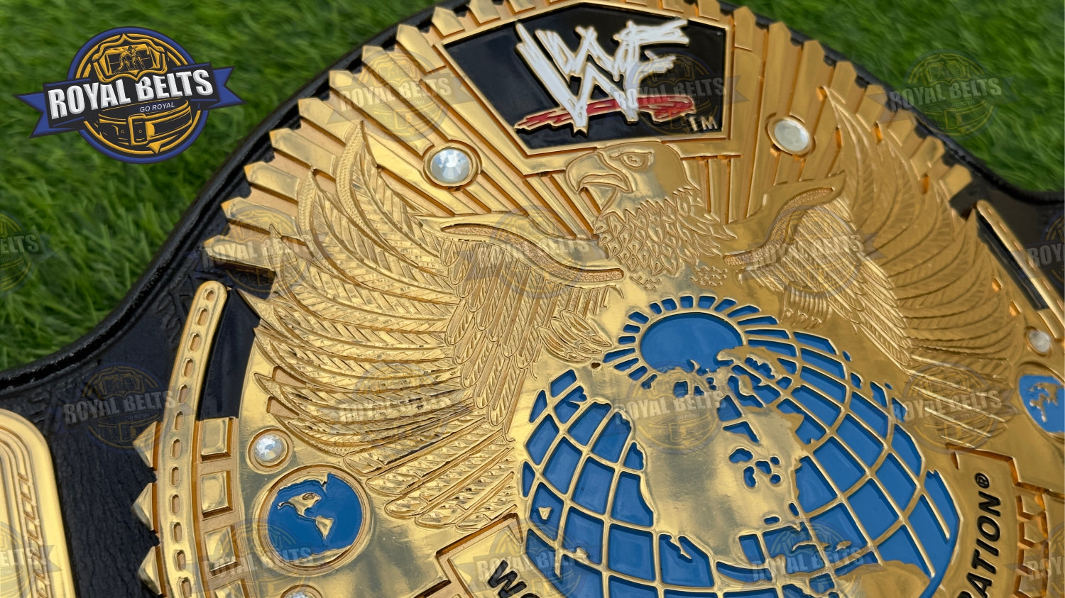 WWF Big Eagle Wrestling Belt raised gold logo, layered 3D center, adjustable snap closure