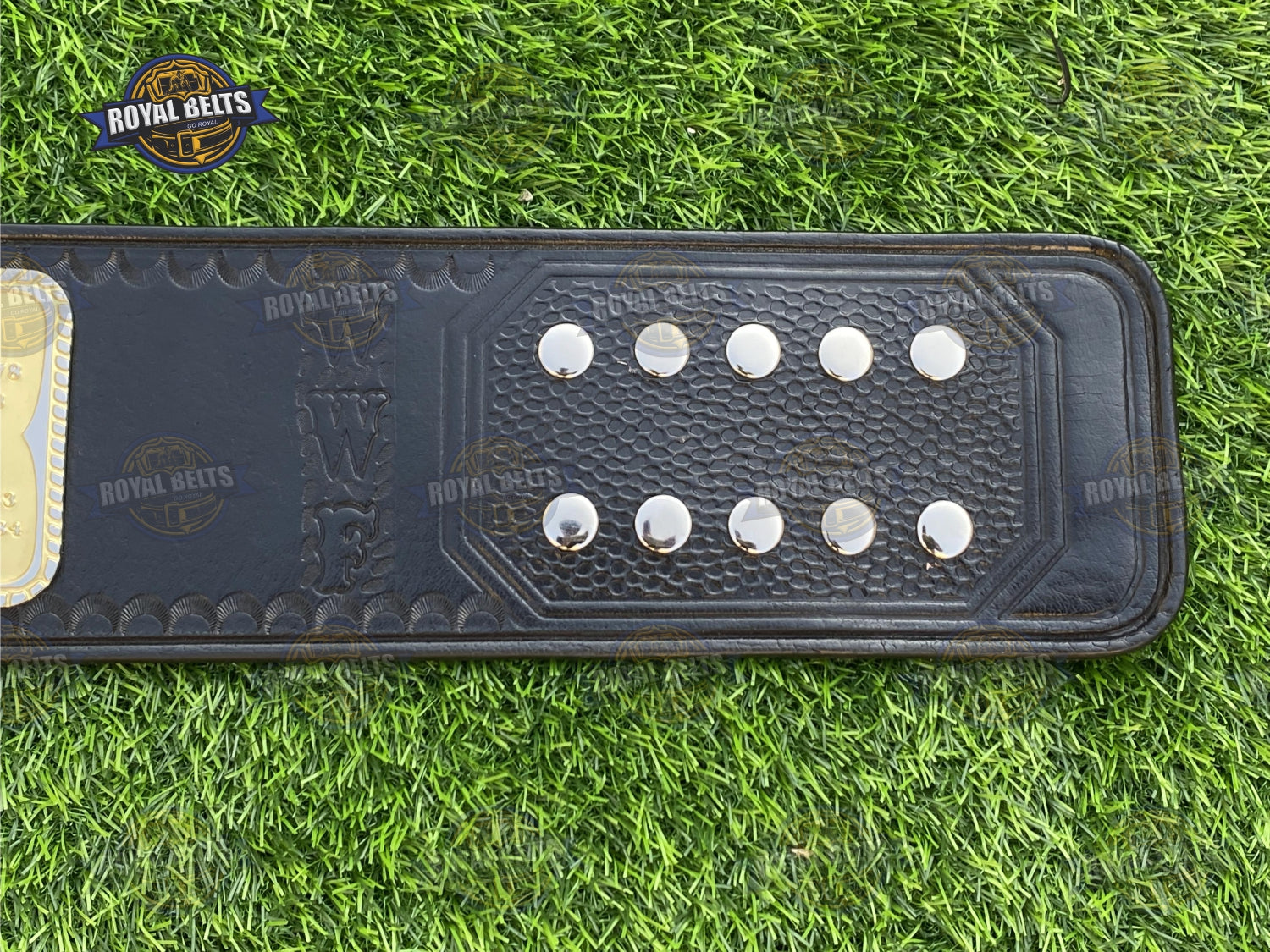 Hulk Hogan championship belt featuring deep engraved borders and reinforced backing