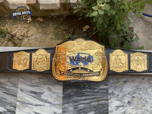 WWF Ric Flair Tag Team belt with gold plated center plates, black leather strap, snap closure Crafted by Royal Belts