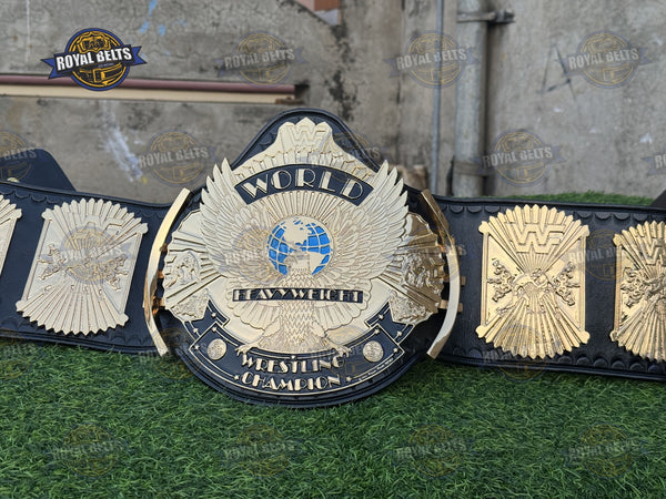 WWF Winged Eagle zinc championship title belt with gold center plate and black leather strap